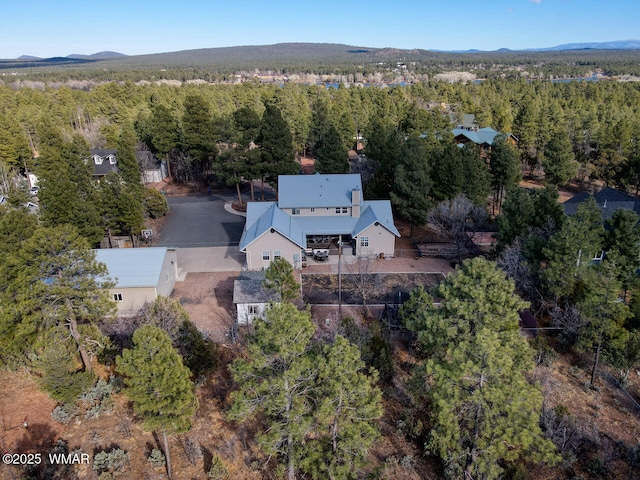 aerial view featuring a view of trees