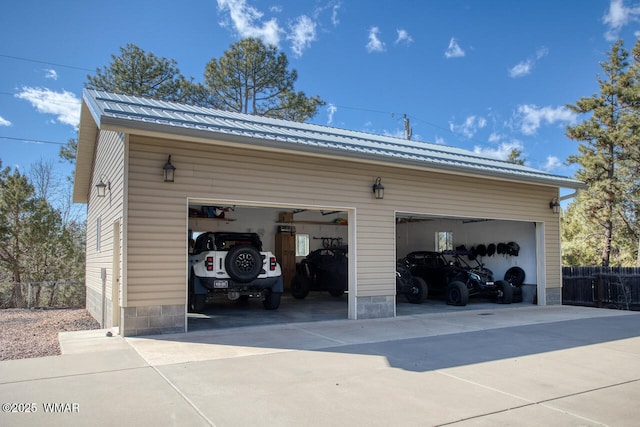 garage with fence