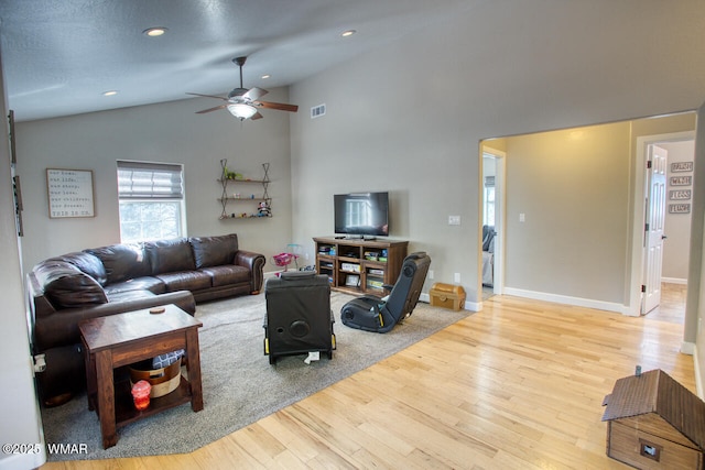 living room with visible vents, baseboards, ceiling fan, recessed lighting, and wood finished floors