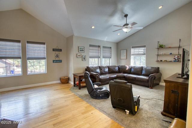 living area featuring recessed lighting, lofted ceiling, a ceiling fan, and wood finished floors