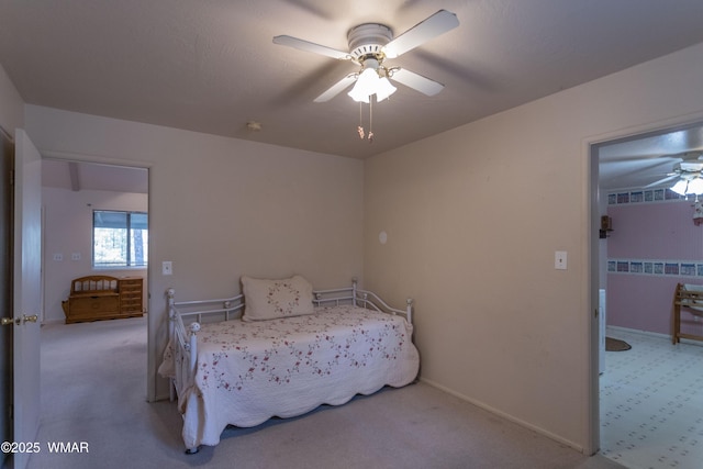 bedroom with baseboards, a ceiling fan, and carpet flooring