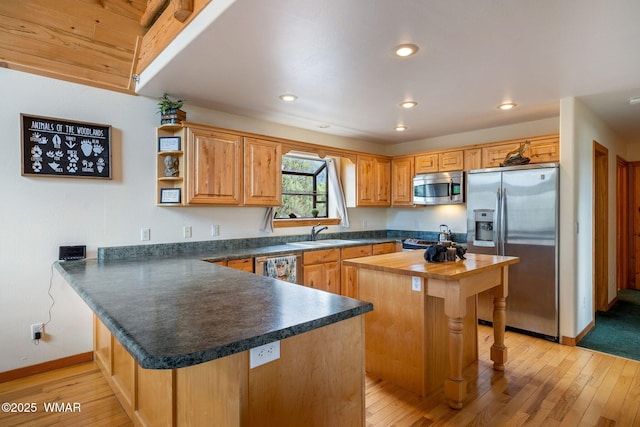 1537 Georgann Cir, Heber, AZ 85928 - kitchen with appliances with stainless steel finishes, butcher block countertops, light wood-style flooring, a peninsula, and recessed lighting