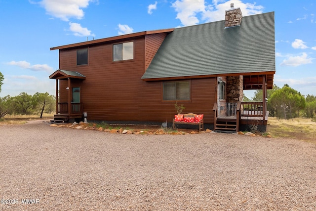1537 Georgann Cir, Heber, AZ 85928 - chalet / cabin featuring a chimney and a wooden deck