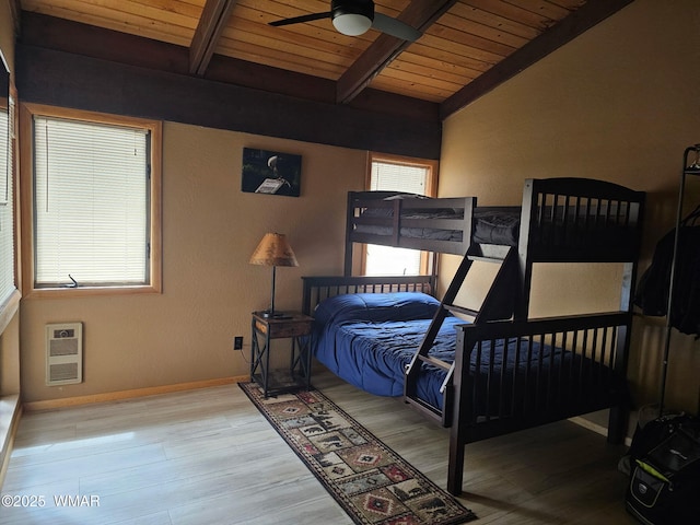 4989 Drifting Snow Loop Unit 4, Pinetop, AZ 85935 - bedroom with lofted ceiling with beams, baseboards, heating unit, wood finished floors, and wood ceiling