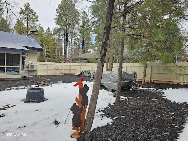 4989 Drifting Snow Loop Unit 4, Pinetop, AZ 85935 - yard layered in snow featuring a fenced backyard