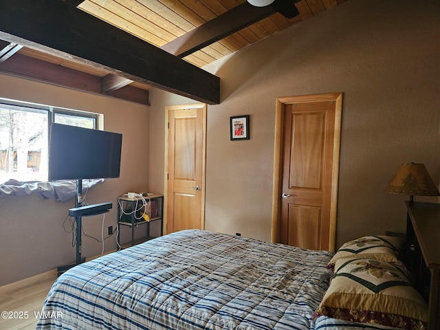 4989 Drifting Snow Loop Unit 4, Pinetop, AZ 85935 - bedroom with light wood-style floors, lofted ceiling with beams, and wood ceiling