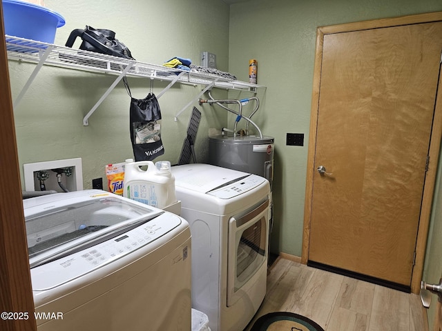4989 Drifting Snow Loop Unit 4, Pinetop, AZ 85935 - laundry room with independent washer and dryer, laundry area, wood finished floors, and water heater