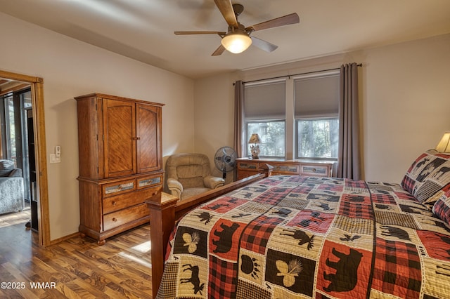 bedroom with light wood-type flooring, ceiling fan, and baseboards