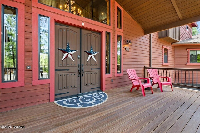 doorway to property featuring a porch