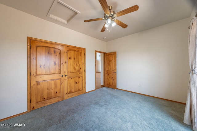 1561 S Canyon Ridge Trl, Show Low, AZ 85901 - unfurnished bedroom with attic access, carpet floors, baseboards, and a ceiling fan