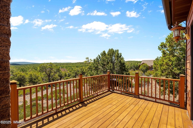 1561 S Canyon Ridge Trl, Show Low, AZ 85901 - wooden terrace with a wooded view