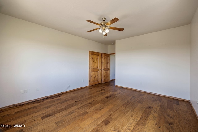 1561 S Canyon Ridge Trl, Show Low, AZ 85901 - empty room featuring ceiling fan, dark wood-type flooring, and baseboards