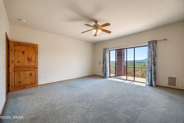 1561 S Canyon Ridge Trl, Show Low, AZ 85901 - carpeted spare room featuring a ceiling fan, baseboards, and a smoke detector
