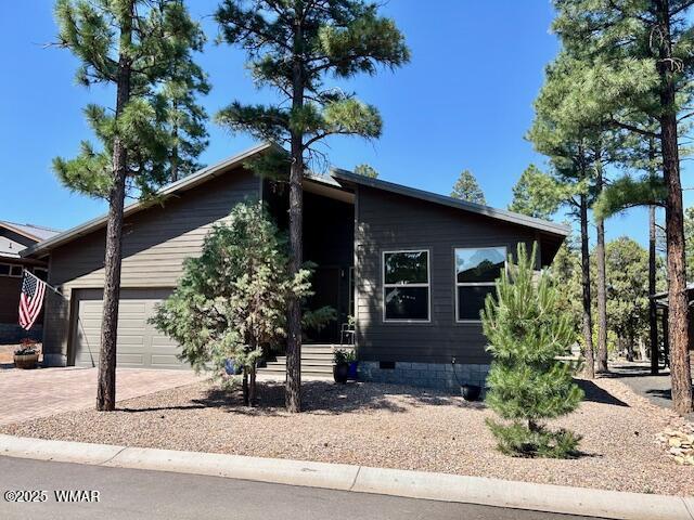 3180 N Eagles Creek Dr, Show Low, AZ 85901 - view of front of house featuring crawl space, driveway, and an attached garage