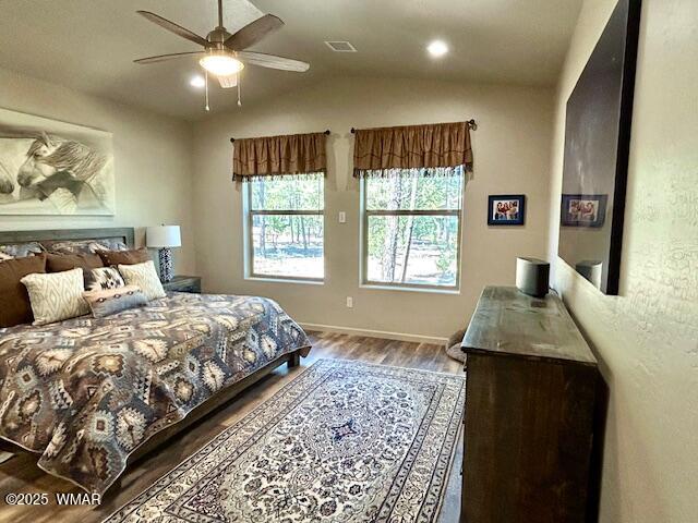 3180 N Eagles Creek Dr, Show Low, AZ 85901 - bedroom with wood finished floors, lofted ceiling, ceiling fan, and recessed lighting