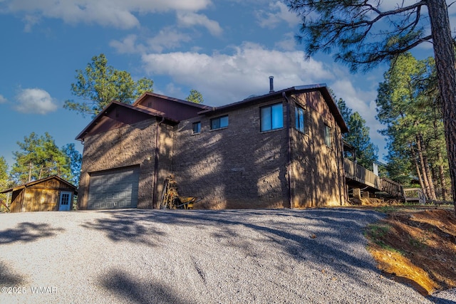 7125 Elk Trl, Show Low, AZ 85901 - view of property exterior featuring driveway and a garage