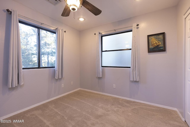 7125 Elk Trl, Show Low, AZ 85901 - carpeted empty room featuring a ceiling fan, baseboards, and recessed lighting
