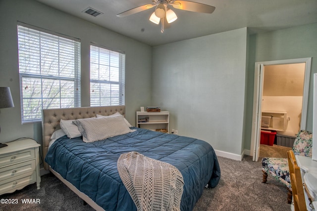 carpeted bedroom with baseboards and ceiling fan