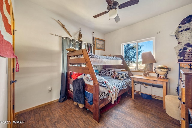 bedroom featuring a ceiling fan, dark wood-style flooring, and baseboards