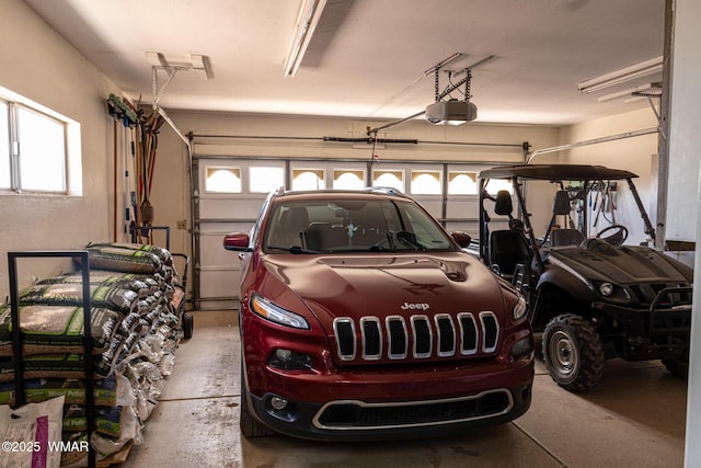 1092 Cedar Dr, Show Low, AZ 85901 - garage with a garage door opener