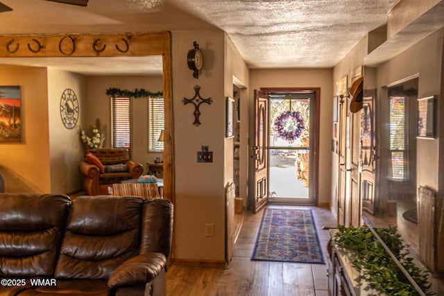 1092 Cedar Dr, Show Low, AZ 85901 - foyer with hardwood / wood-style flooring and a textured ceiling