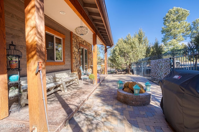 view of patio / terrace with fence and grilling area