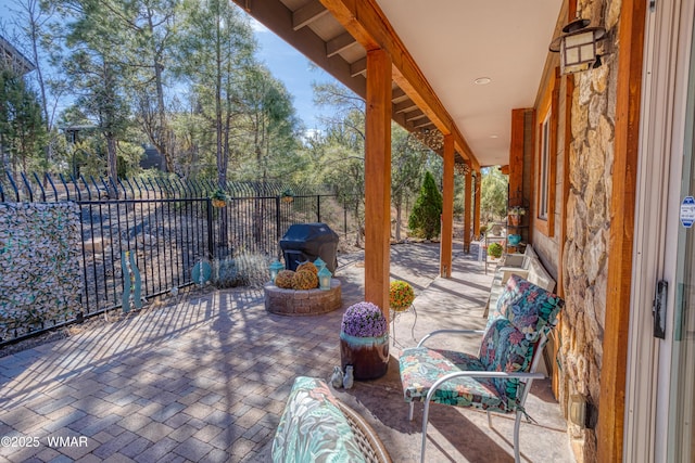 view of patio / terrace featuring area for grilling and a fenced backyard