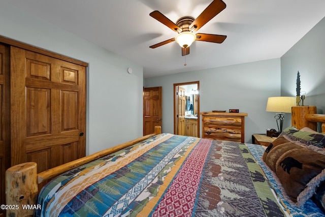 bedroom with a ceiling fan and ensuite bathroom