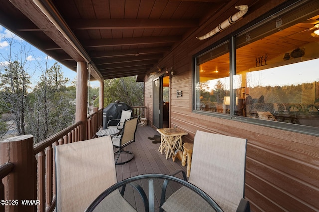 wooden deck with grilling area