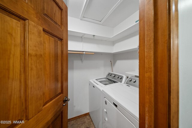 laundry area with laundry area, baseboards, and separate washer and dryer