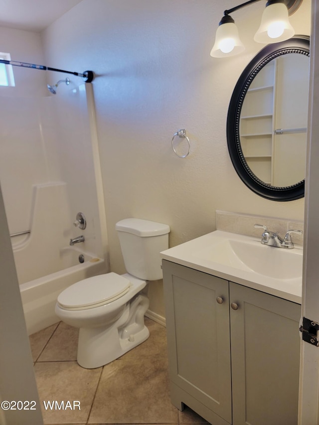 bathroom with shower / bath combination, vanity, toilet, and tile patterned floors