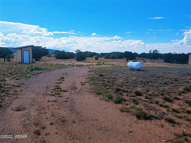 view of street featuring a rural view