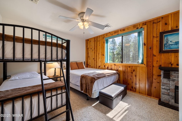 2 Acr 1027, Greer, AZ 85927 - bedroom featuring wooden walls, carpet flooring, baseboards, and ceiling fan