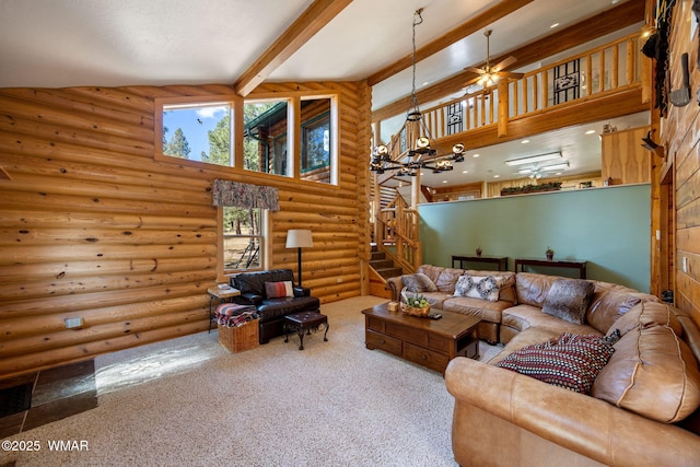 2 Acr 1027, Greer, AZ 85927 - living room with high vaulted ceiling, beamed ceiling, stairs, carpet floors, and rustic walls