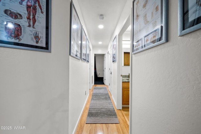 323 N Woodland Rd, Lakeside, AZ 85929 - hallway featuring light wood-style flooring, recessed lighting, and baseboards