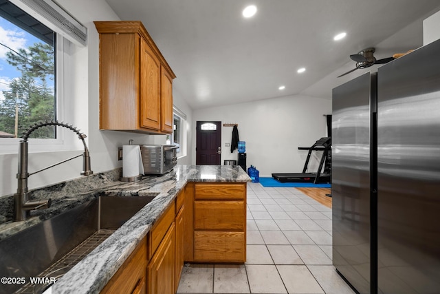 323 N Woodland Rd, Lakeside, AZ 85929 - kitchen with freestanding refrigerator, a sink, recessed lighting, brown cabinetry, and ceiling fan