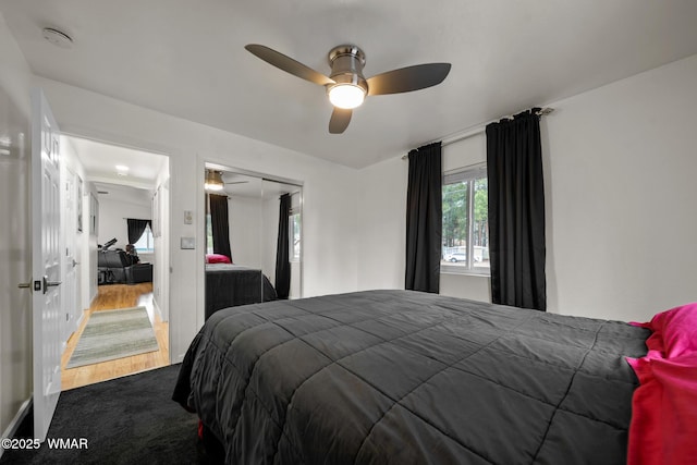 323 N Woodland Rd, Lakeside, AZ 85929 - carpeted bedroom with a closet and a ceiling fan