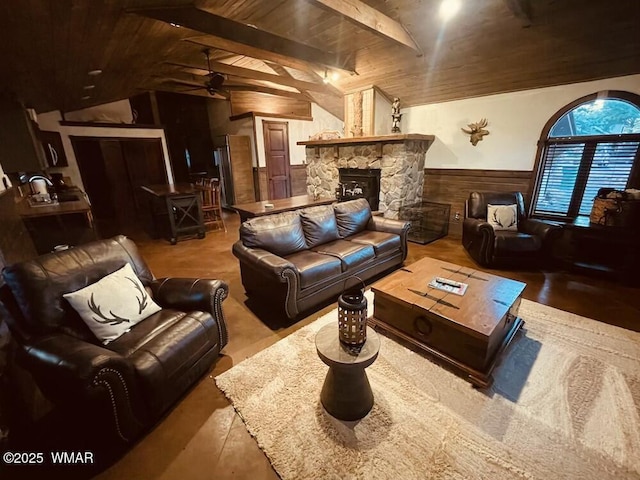 4971 Buck Springs Rd, Pinetop, AZ 85935 - living room with wooden walls, a wainscoted wall, vaulted ceiling with beams, a stone fireplace, and wooden ceiling