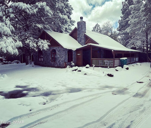 4971 Buck Springs Rd, Pinetop, AZ 85935 - exterior space featuring stone siding and a chimney
