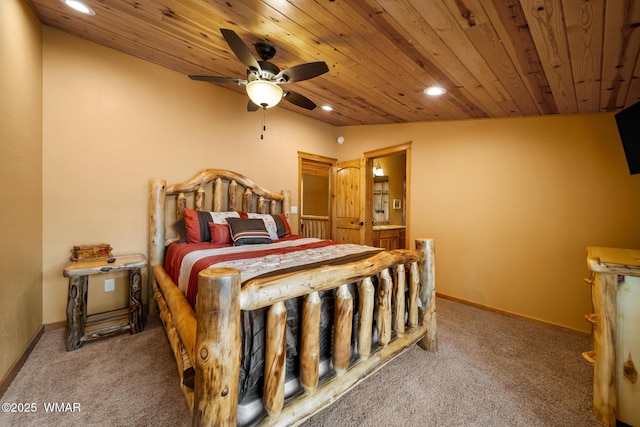 2011 N Lake Breeze Rd, Lakeside, AZ 85929 - carpeted bedroom with wooden ceiling, recessed lighting, baseboards, ensuite bath, and vaulted ceiling