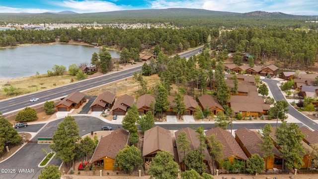 2011 N Lake Breeze Rd, Lakeside, AZ 85929 - aerial perspective of suburban area featuring a water and mountain view and a heavily wooded area