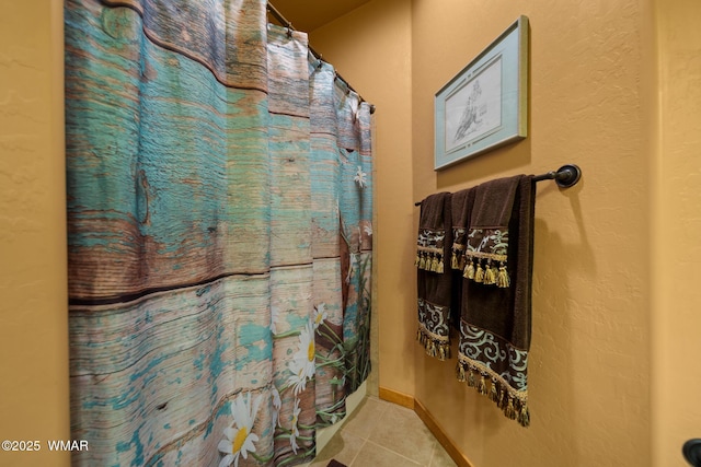 2011 N Lake Breeze Rd, Lakeside, AZ 85929 - bathroom with tile patterned flooring and a shower with curtain