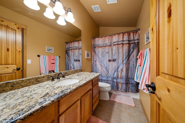 2011 N Lake Breeze Rd, Lakeside, AZ 85929 - full bathroom featuring tile patterned floors, a chandelier, vanity, and toilet