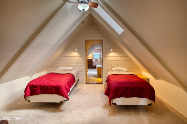 5029 Show Low Lake Rd, Show Low, AZ 85901 - carpeted bedroom with lofted ceiling, a skylight, and ceiling fan