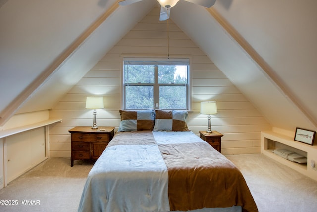 5029 Show Low Lake Rd, Show Low, AZ 85901 - carpeted bedroom featuring wood walls, vaulted ceiling, and a ceiling fan