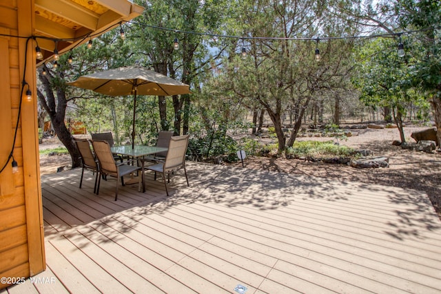 5029 Show Low Lake Rd, Show Low, AZ 85901 - wooden terrace with outdoor dining space and view of scattered trees