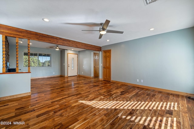 unfurnished living room featuring a ceiling fan, baseboards, wood finished floors, and recessed lighting