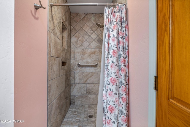 bathroom with a stall shower