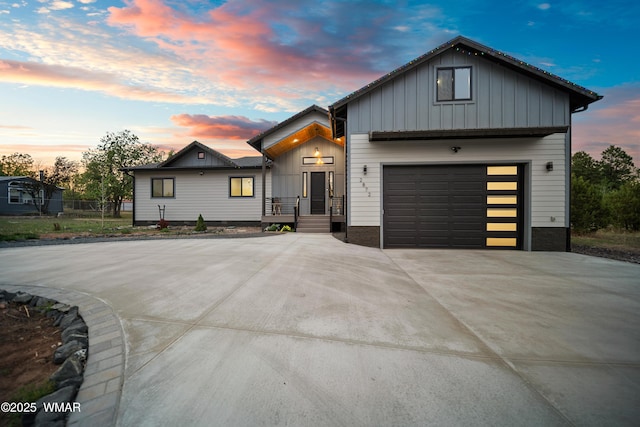 2872 Penny Ln, Lakeside, AZ 85929 - view of front of property featuring board and batten siding, concrete driveway, and an attached garage