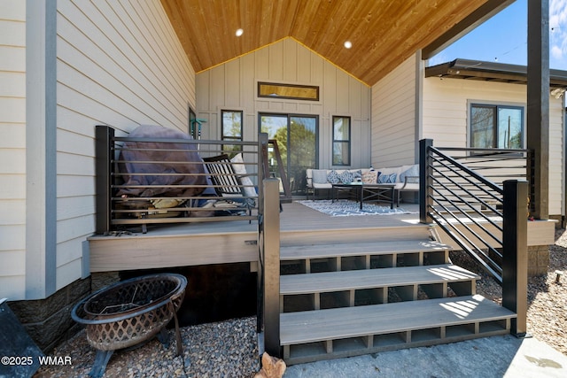 2872 Penny Ln, Lakeside, AZ 85929 - property entrance with an outdoor hangout area, a wooden deck, and board and batten siding